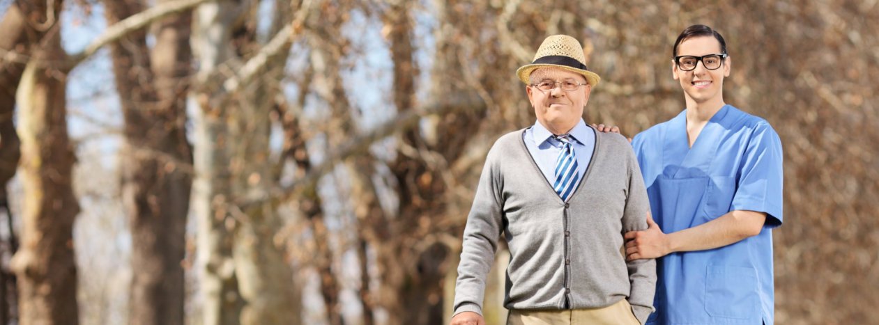 Old man with his caregiver